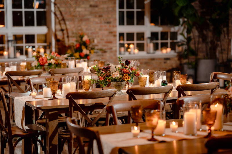 Fall wedding decor and flowers on tables at Loft Lucia