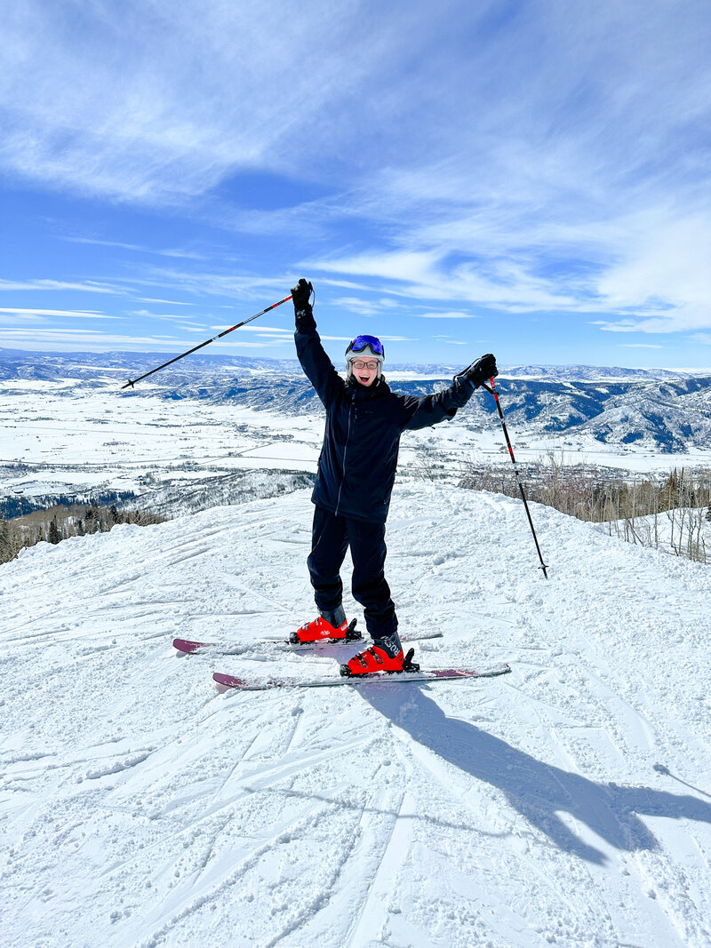 Erika skiing in the mountains in Colorado