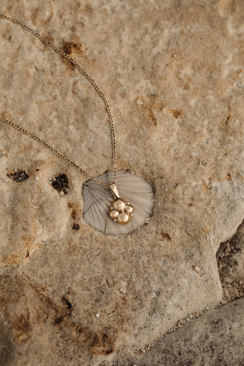 kaboompics_simplicity-by-the-sea-minimalist-jewelry-on-maltas-rocky-beach-31097