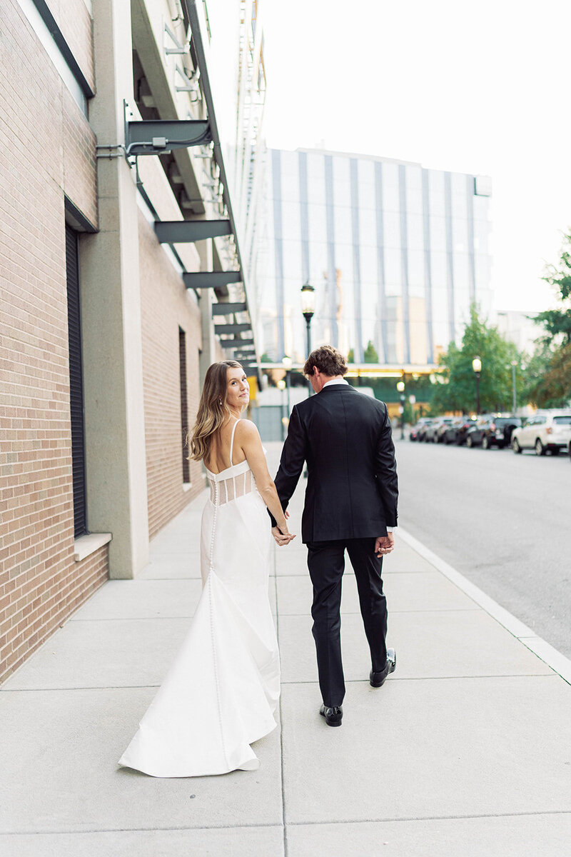 Romantic portrait of couple walking around Boston

