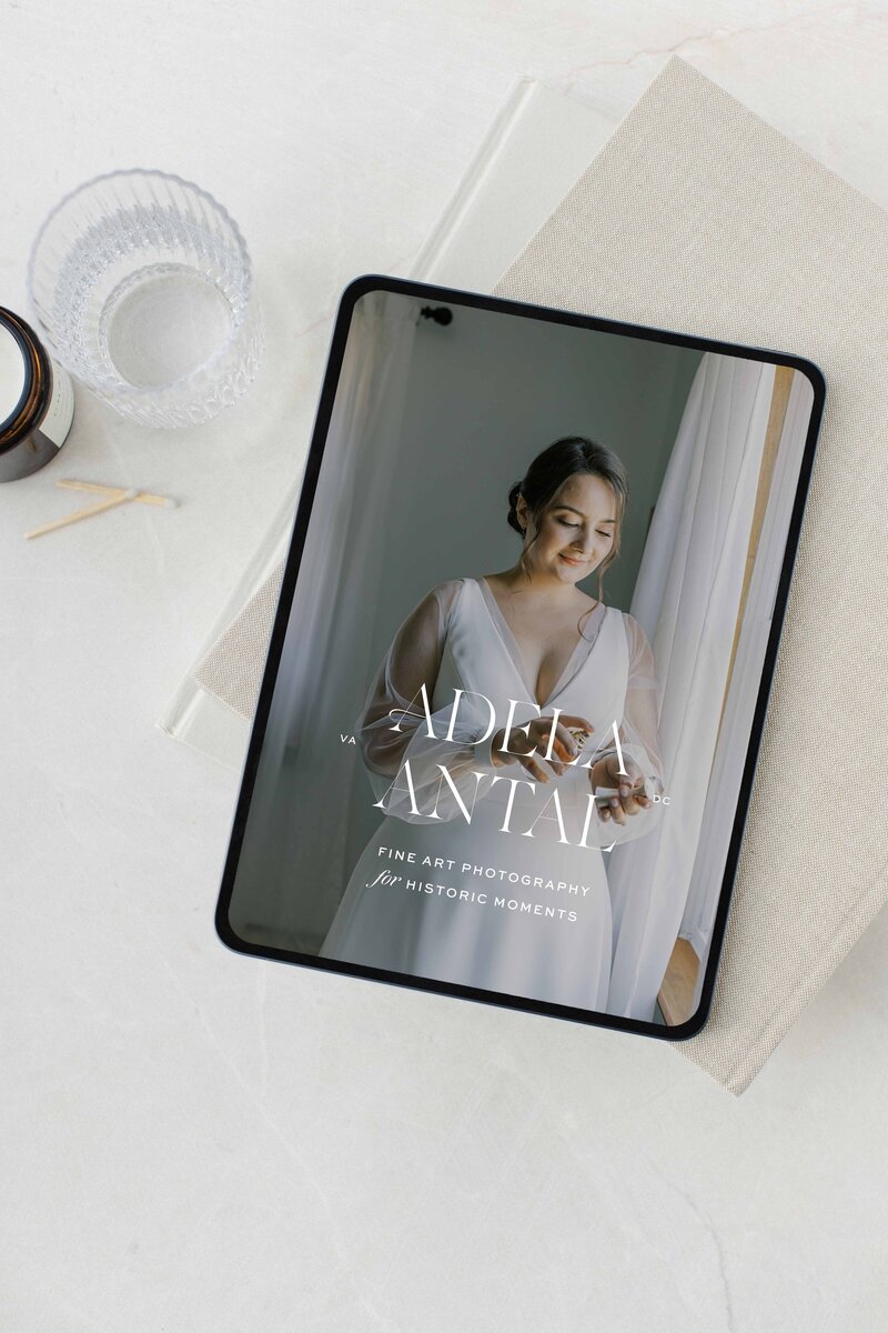Neutral wedding photographer branding on iPad