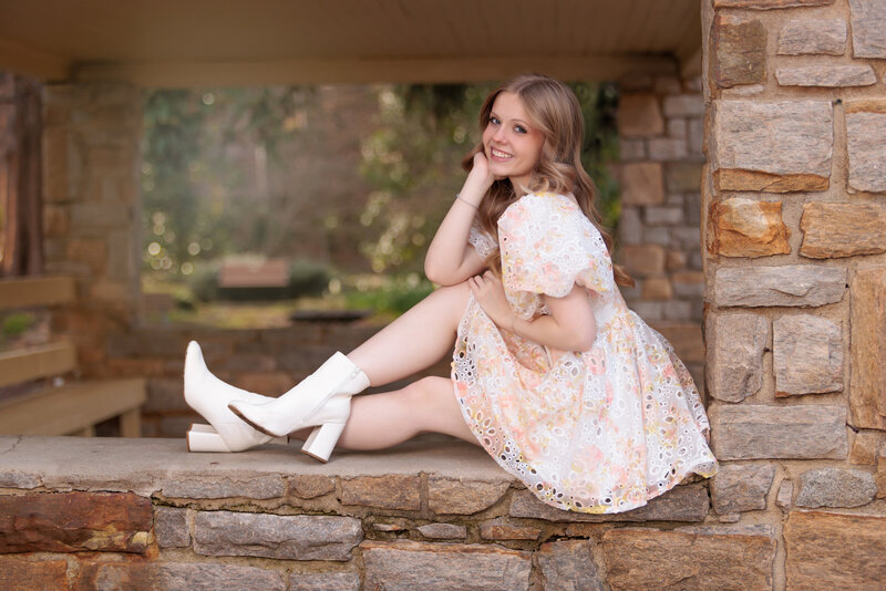 Teen Portraits against a stone wall in Raleigh, NC.