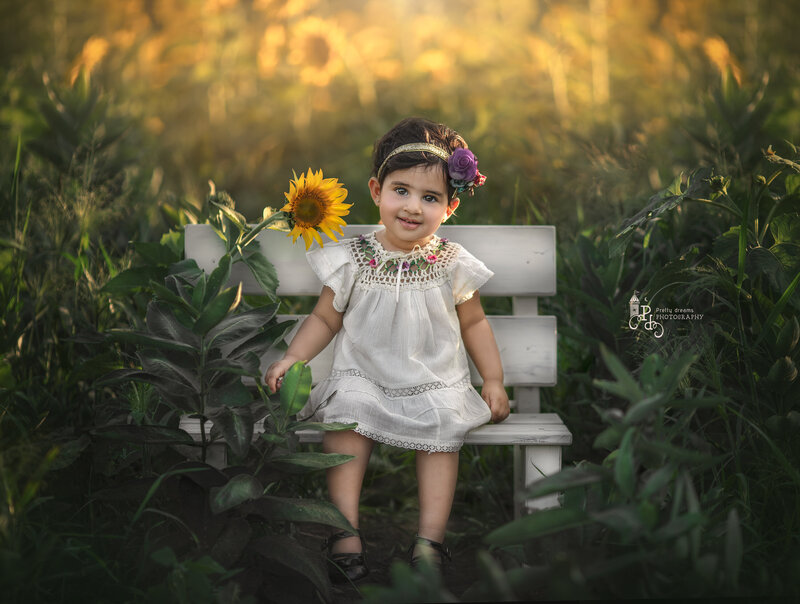  "6-month-old baby captured in a beautiful milestone portrait, showcasing their expressions and personality during this special stage in Ottawa."