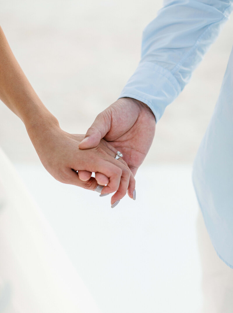 Newlyweds Holding Hands