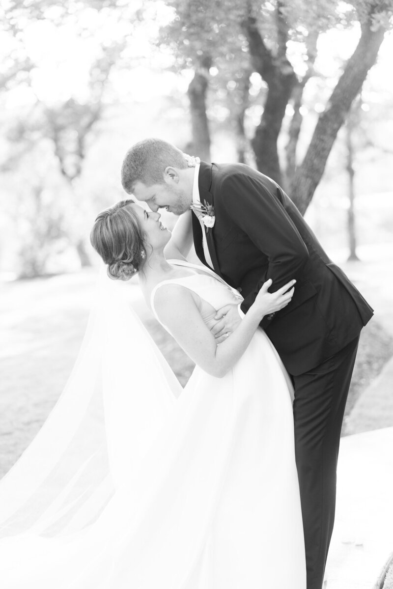 Film wedding photography of couple at Canyonwood Ridge surrounded by oak trees