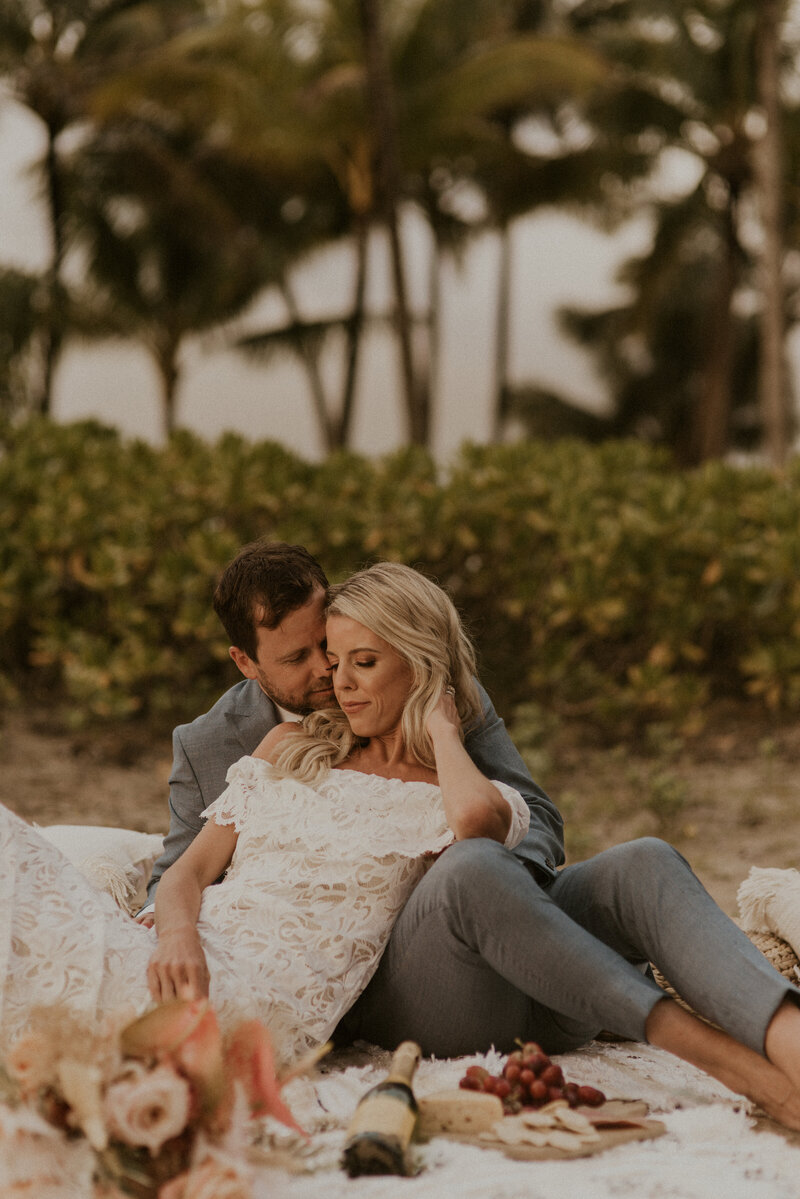 Bohemian bride holding her dress and bouquet