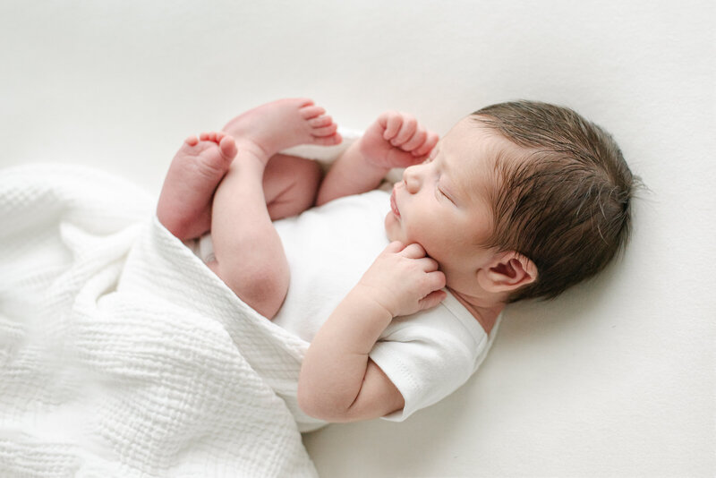 Portrait of newborn baby napping