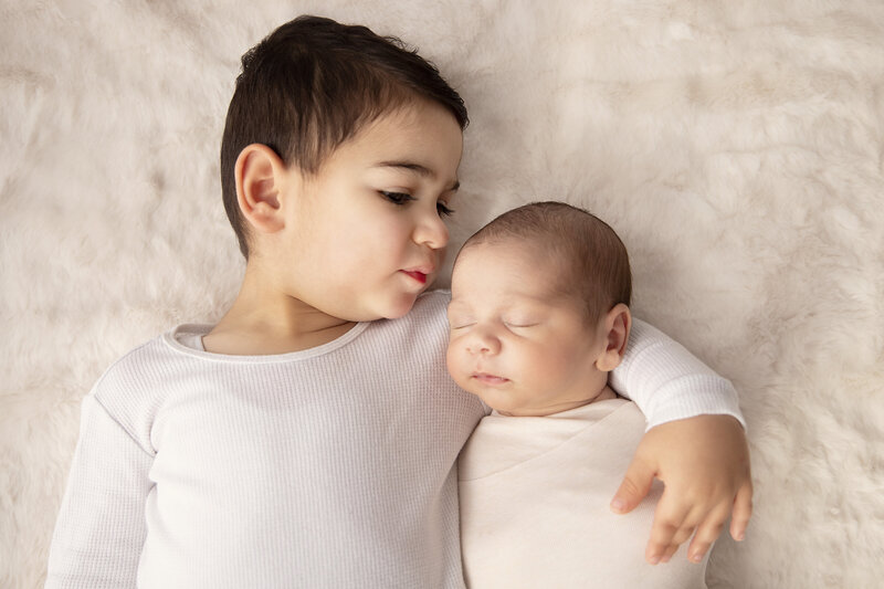 Newborn And Sibling