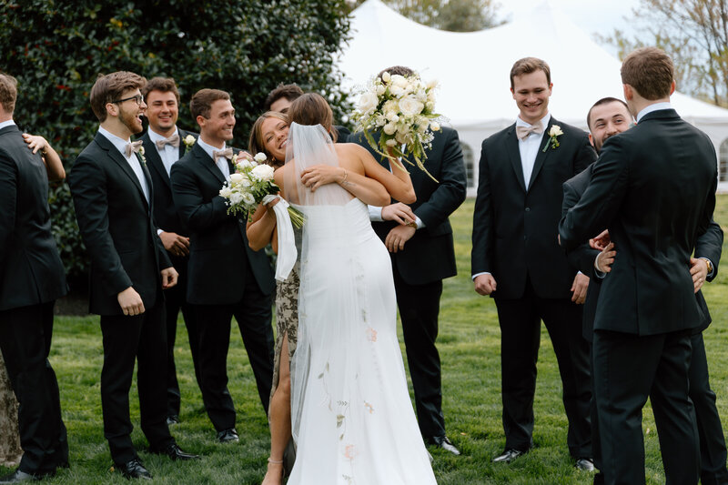 A joyful celebration between a bride and her sister at Historic Whitewood in Powhatan, Virginia.