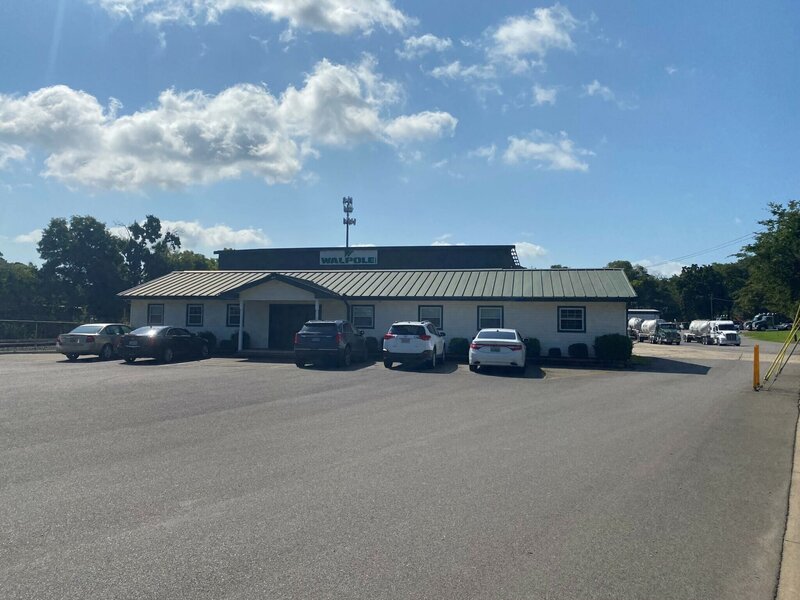 Walpole Inc. modern trucks with well-maintained equipment, operating in Alabama for safety and efficiency.