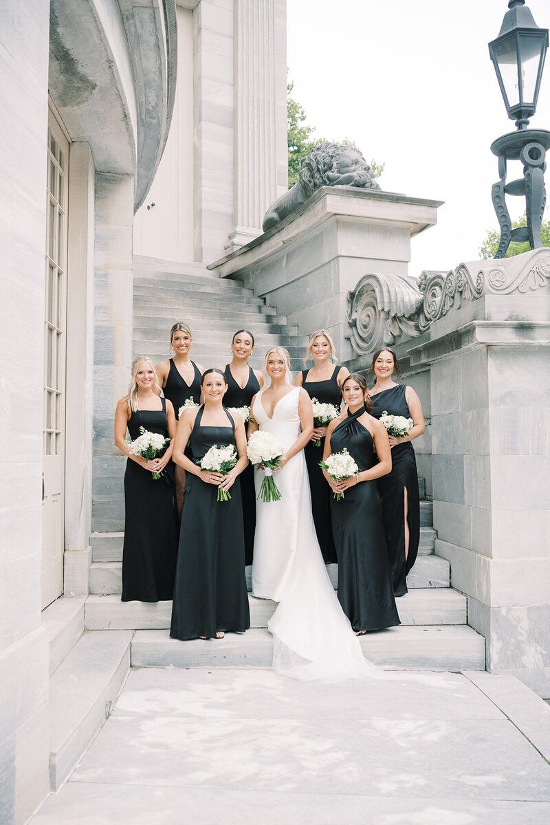 A few joyful moments among the bride and bridesmaids at the lane at Crossed Keys Estate captured by NJ Wedding Photographers | Michelle Behre Photography