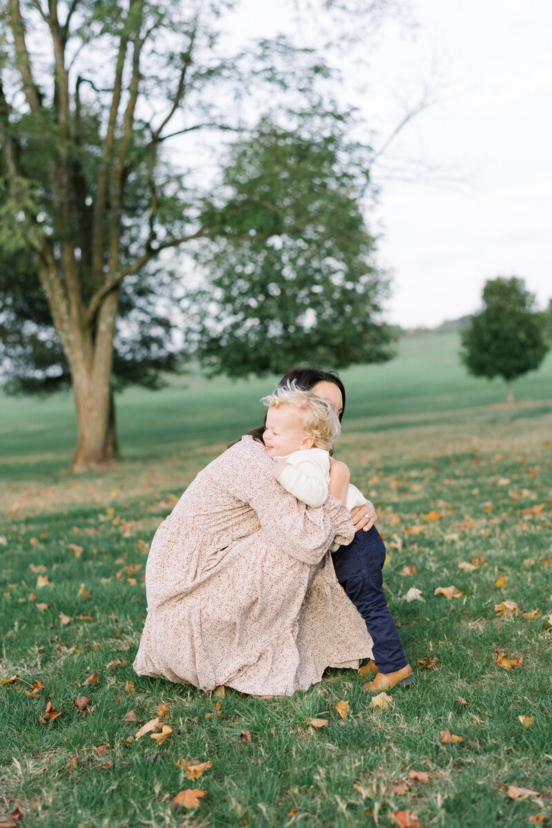 Mother and son hugging in Nashville park