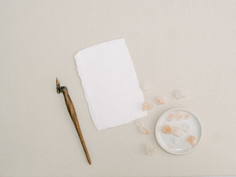 A writer takes notes on a notepad
