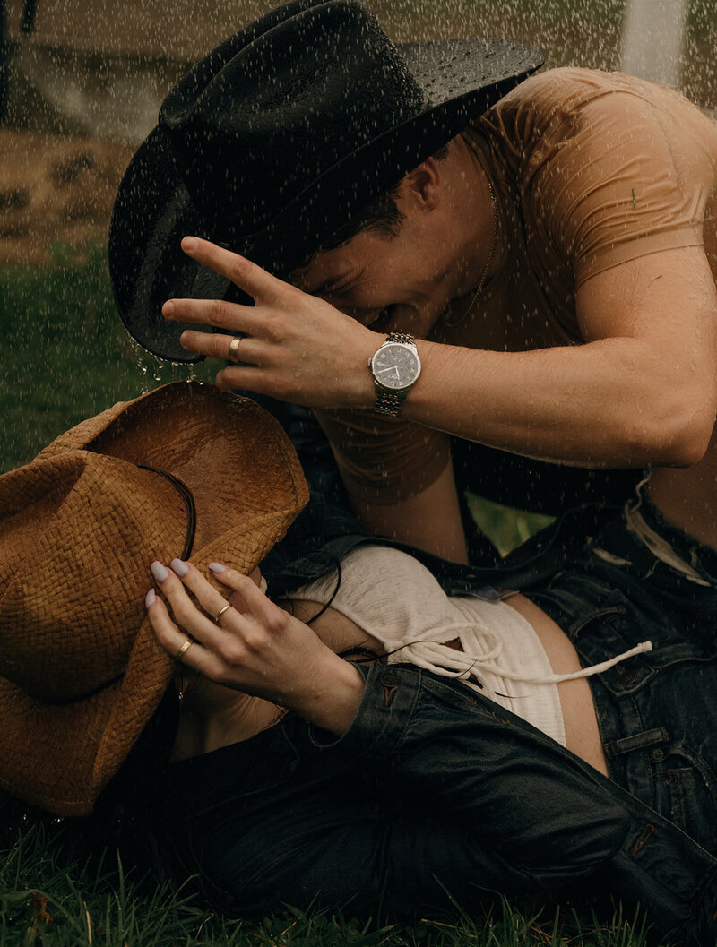 Rhode Island and Destination Wedding Photographer | Cinematic, Moody, Storytelling | Aisha Lee Photography | Couple wearing cowboy hats for an engagement session
