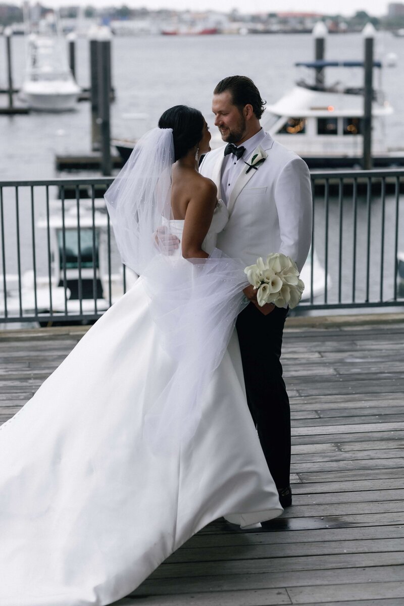 Newlyweds Smiling at Boston Harbor