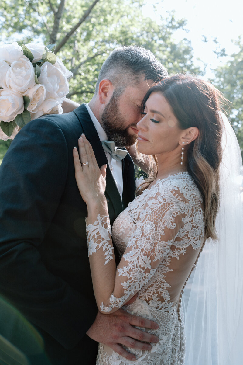 An intimate photo of a bride and groom on their wedding day.