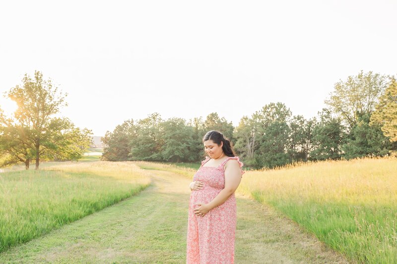 Natural light pregnancy and maternity portraits in Omaha, NE by Claire Katan Creative.