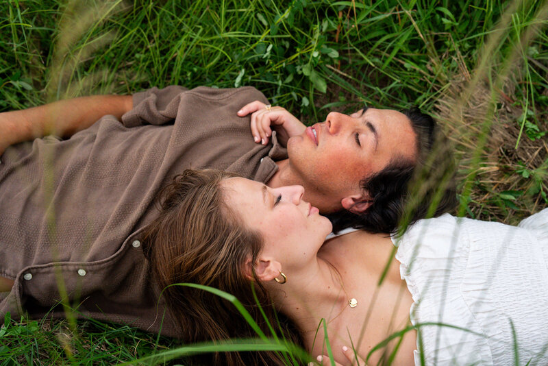 Girl pulling camera out of black travel bag