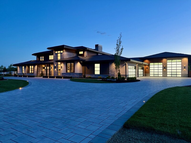 Exterior shot of The Stillwater Modern Prairie project by Eagle Idaho luxury custom home builder and architect Thompson Homes