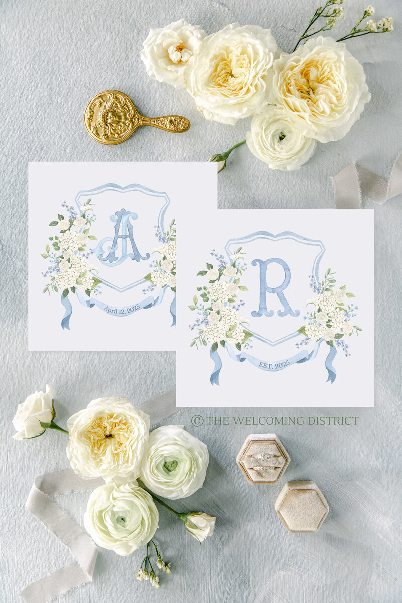 Light blue wedding crest and monogram by Alicia Betz of The Welcoming District.