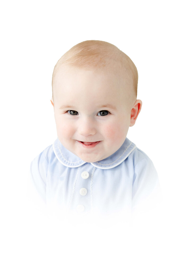 Baby boy smiling at camera for heirloom photography in mini model rep program