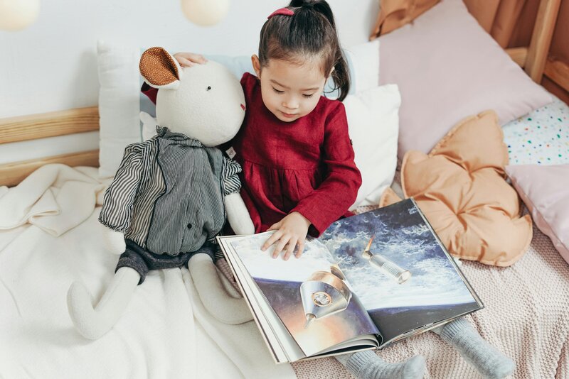  A certified dyslexia specialist conducting a comprehensive assessment with a young student, identifying specific learning needs to tailor effective intervention strategies.