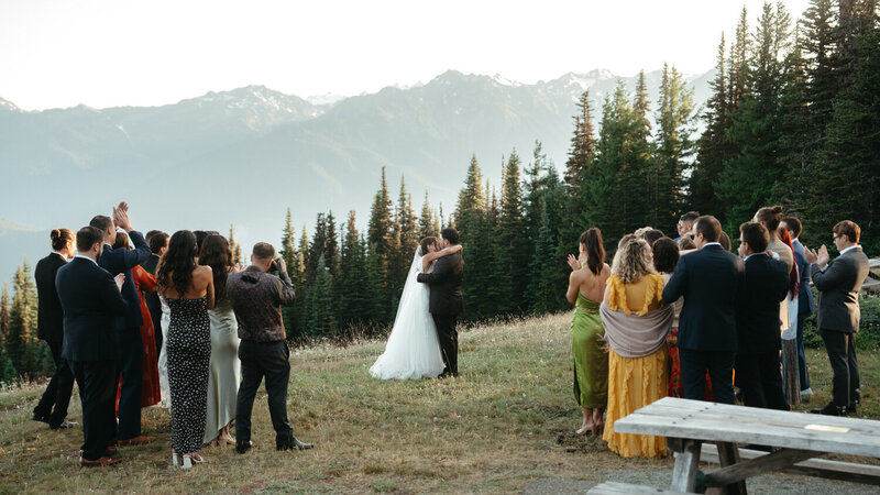 Olympic National Park Wedding ceremony at Hurricane Ridge with cheering guests.