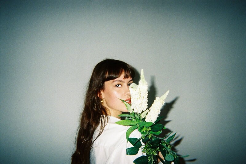 Image of woman posing with flower from Travel photographer at ADP Studio
