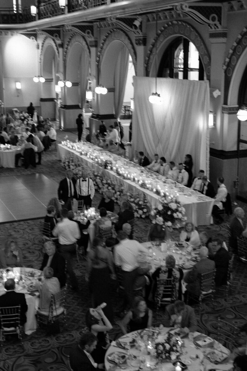 Head Table filled with Lush Florals and Pillar Candles