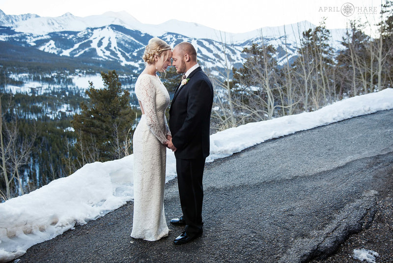 A romantic posed photo for a couple at their winter wedding at The Lodge at Breckenridge in Colorado