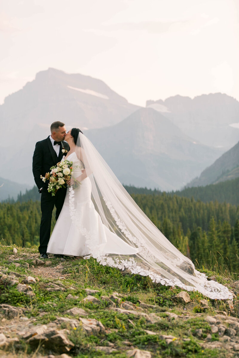 bride and groom kissing