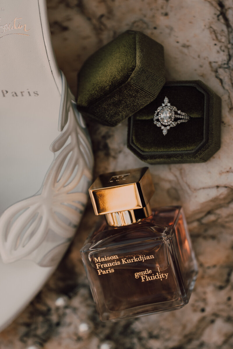 Elegant bridal details with ring, shoes, and perfume at Arizona wedding planned by BTO Events