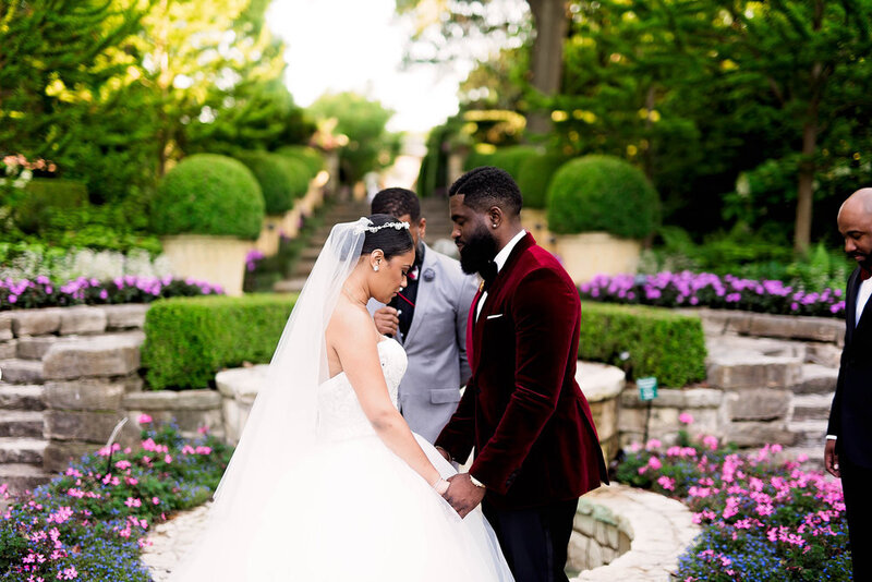 Swank Soiree Dallas Wedding Planner Kerri and Bravion at the Dallas Arboretum and Botanical Garden - Exchanging Vows