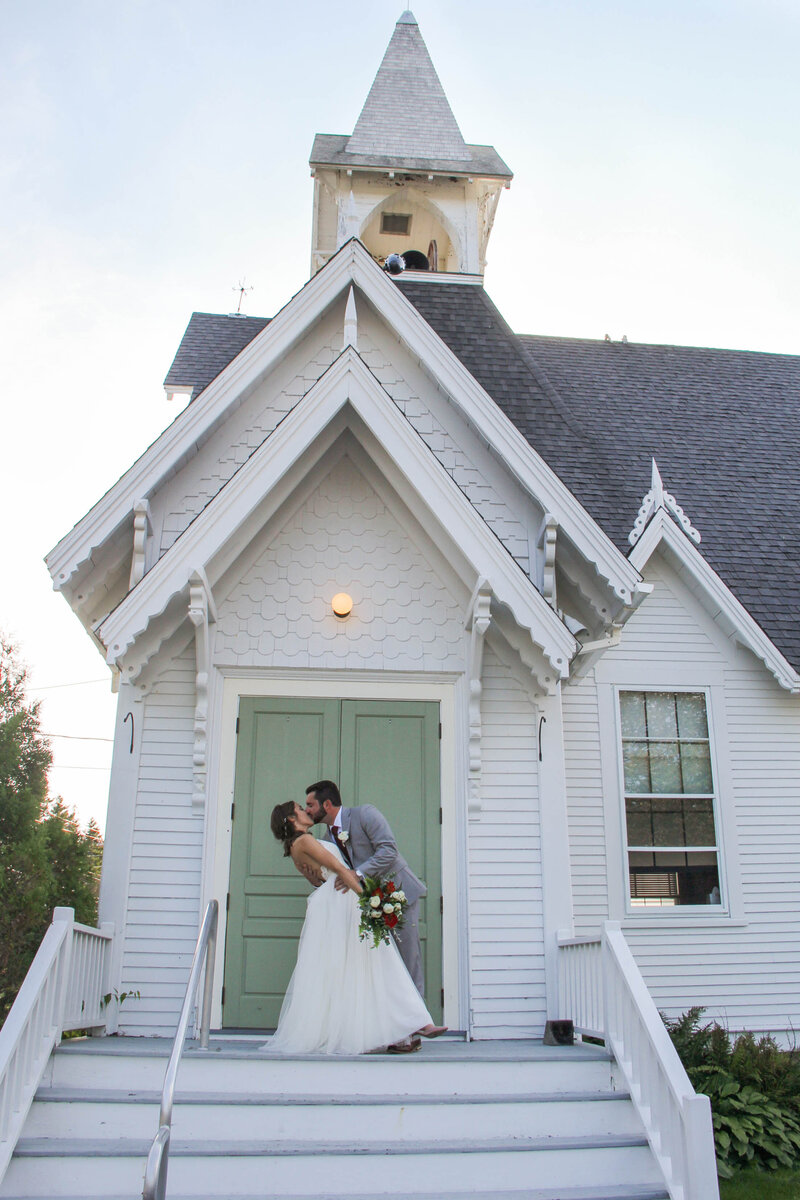 Bride and Groom kissing outside of church | Bar Harbor, Maine Wedding Photography