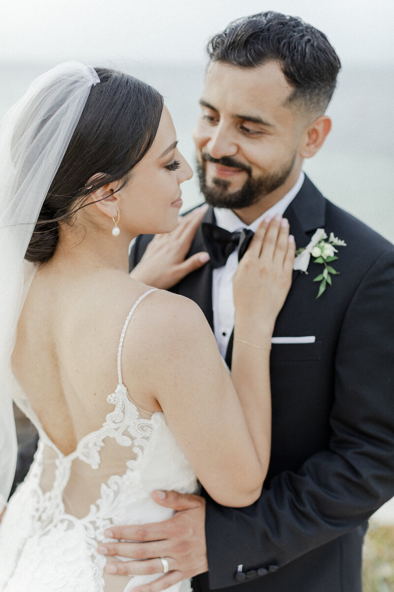 bride and groom embrace