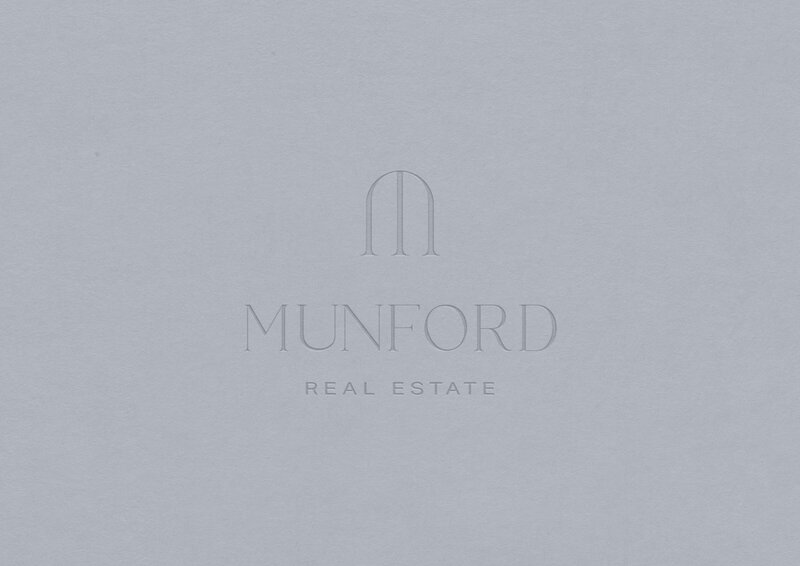1Munnford Real Estate Logo website Brand Emboss Effect Paper Mockup 9x6 letterhead