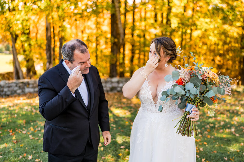 After the bride, Courtney, and her father had their emotional  father daughter first look, they share a moment wiping away their tears. - Croydon New Hampshire