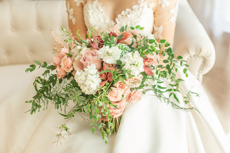 Bridal boutique with white and pink flowers