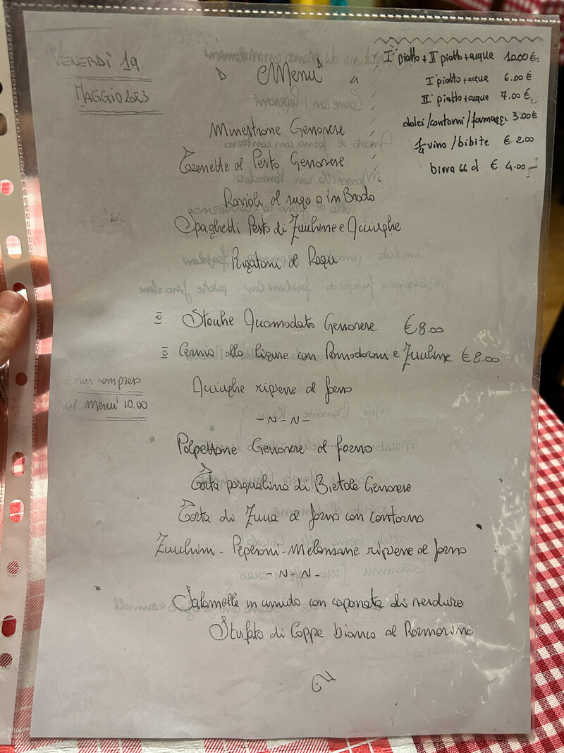 Handwritten menu with specials  at Trattoria da Maria in Genoa, Italy