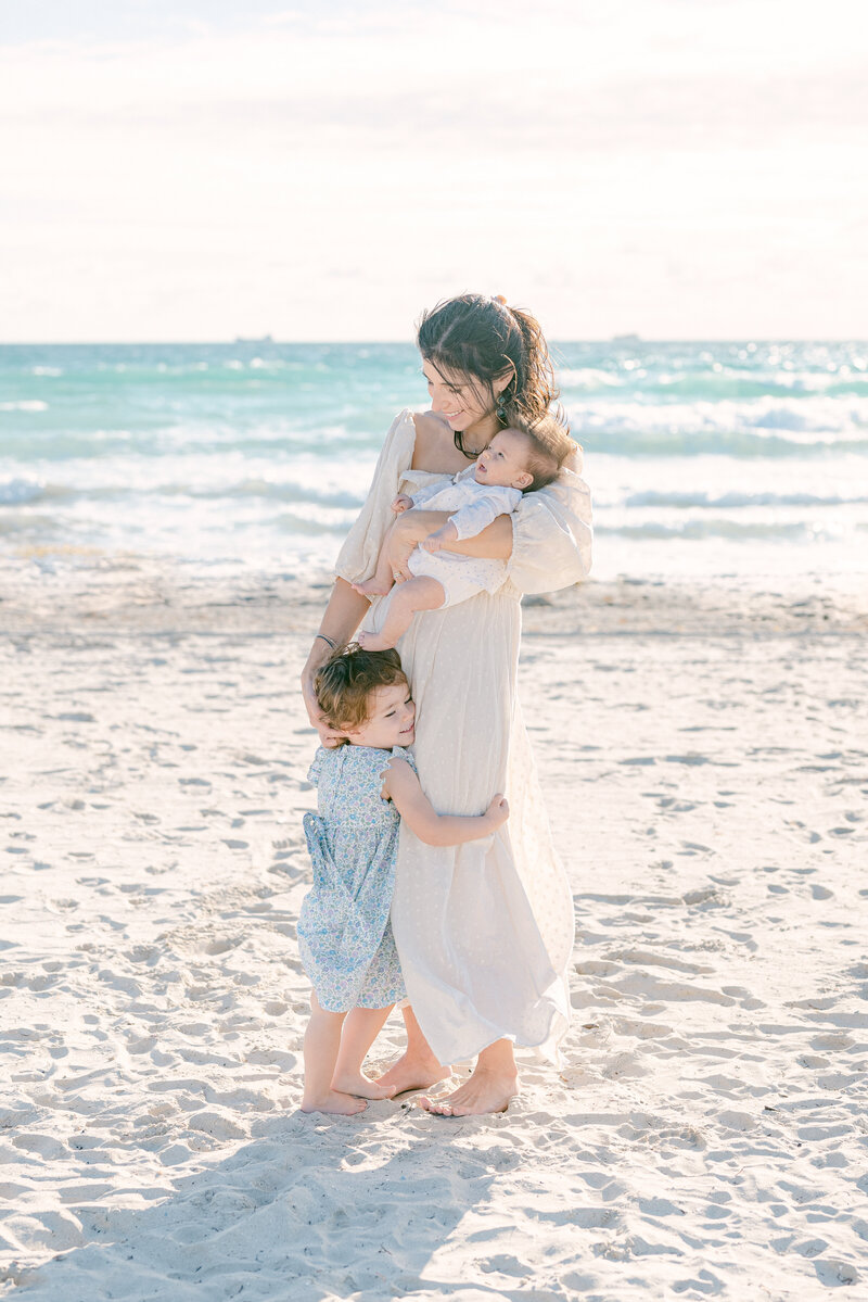 Beach family session with mom and 2 babies