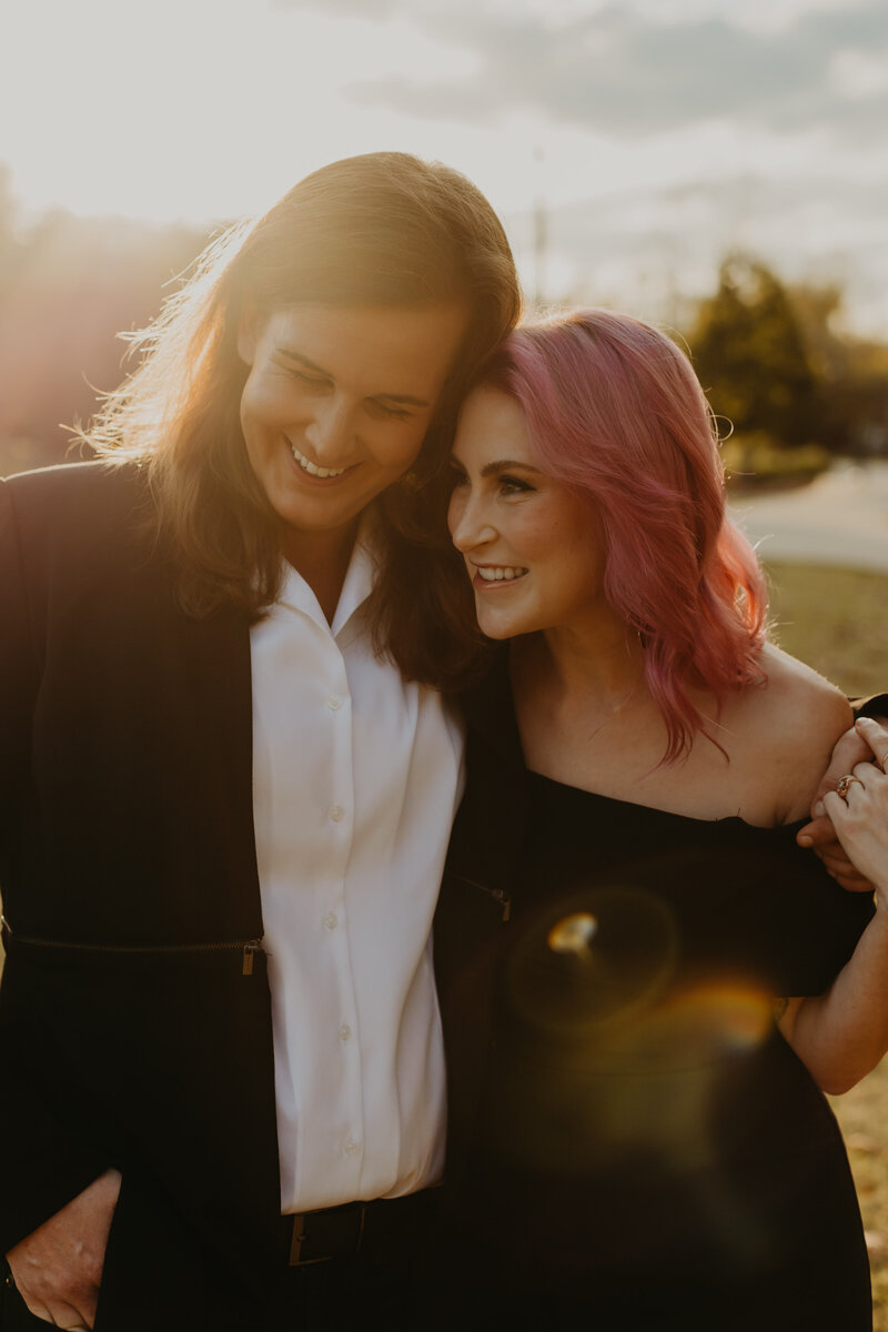 couple laughing in nashville at sunset