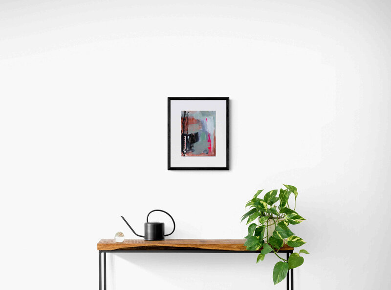 Wooden_console_table_with_plant_and_watering_can