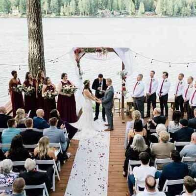 Best Seattle wedding photographers create natural moments at intimate backyard wedding on Lake Mason