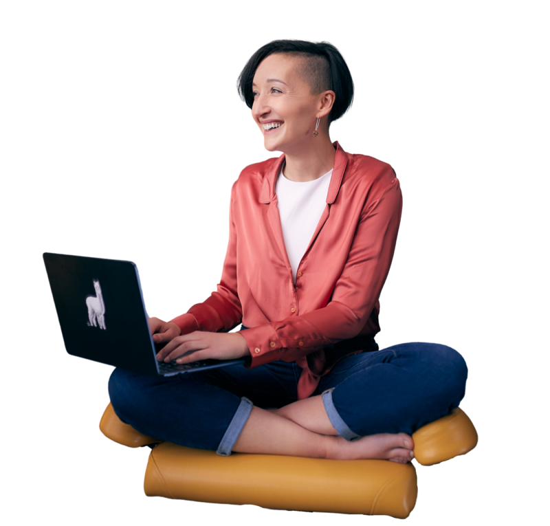 Tarzan, a slim, 38-year-old white woman in a peach low-collared silk dress shirt and ripped jeans