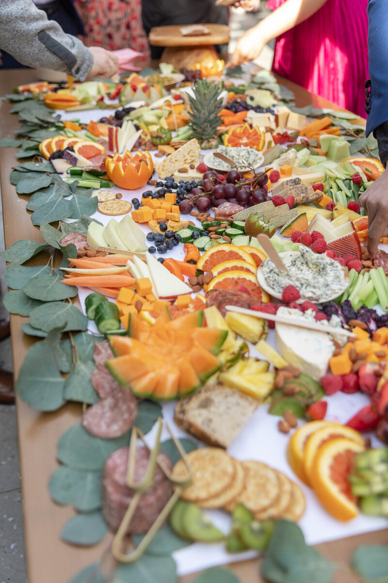 Hart and Main's exotic Fruit Buffet: an entire table covered with sliced oranges, mangos, melons, strawberries and  much more.--perfect for a quick refreshment during any wedding or party