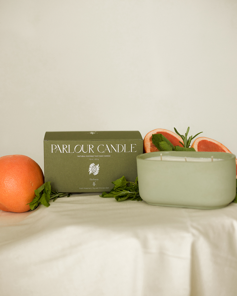 Parlour Candle is a handcrafted candle and home decor line created in a 100-year-old studio space. Using 100% natural coconut soy wax and high-quality, paraben- and phthalate-free fragrance oils, each candle vessel and decor piece is handmade with natural earth pigments and concrete. The line emphasizes sustainability, featuring fully recyclable vessels and no excess plastic in the packaging.