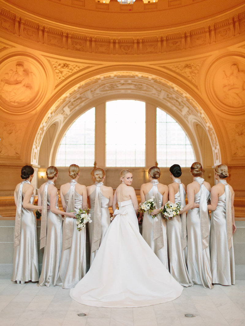Bridesmaids for wedding by Jenny Schneider Events at the San Francisco City Hall. Photo by Larissa Cleveland Photography.
