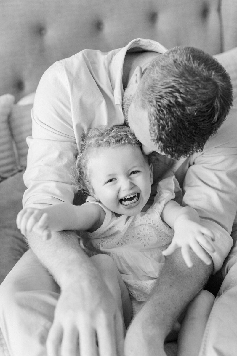 daddy and giggling toddler by Orlando family photographer