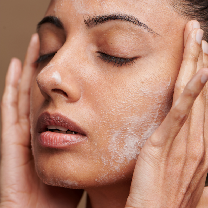 woman  washing face