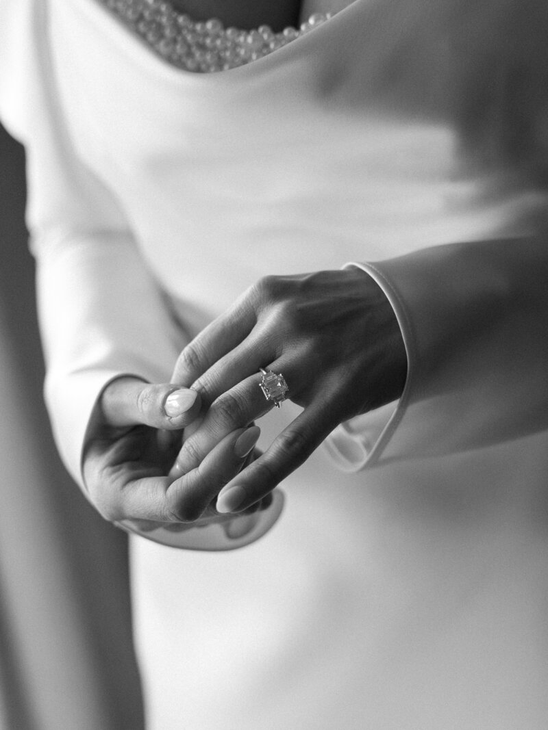 Close-up of a bridal portrait featuring the bride’s hands and wedding ring, captured by a Madison wedding photographer.